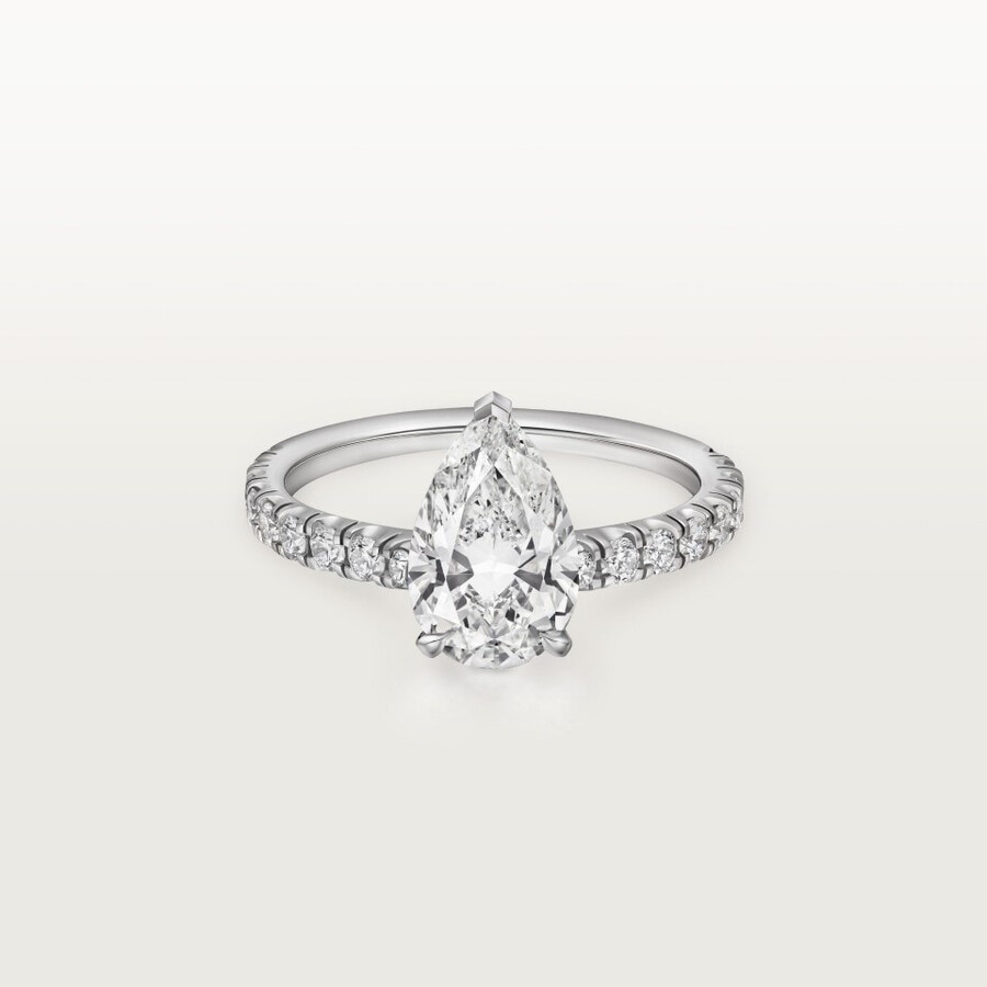solitario del 1895 diamante a forma di pera pavé