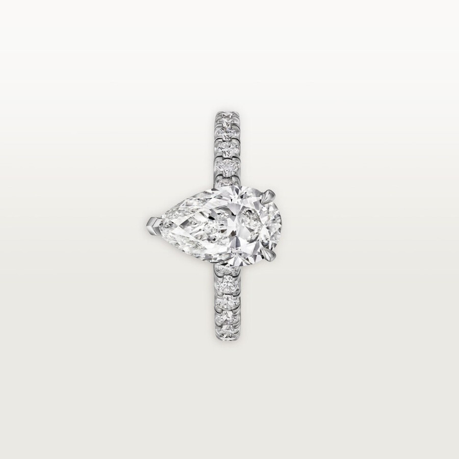 solitario del 1895 diamante a forma di pera pavé